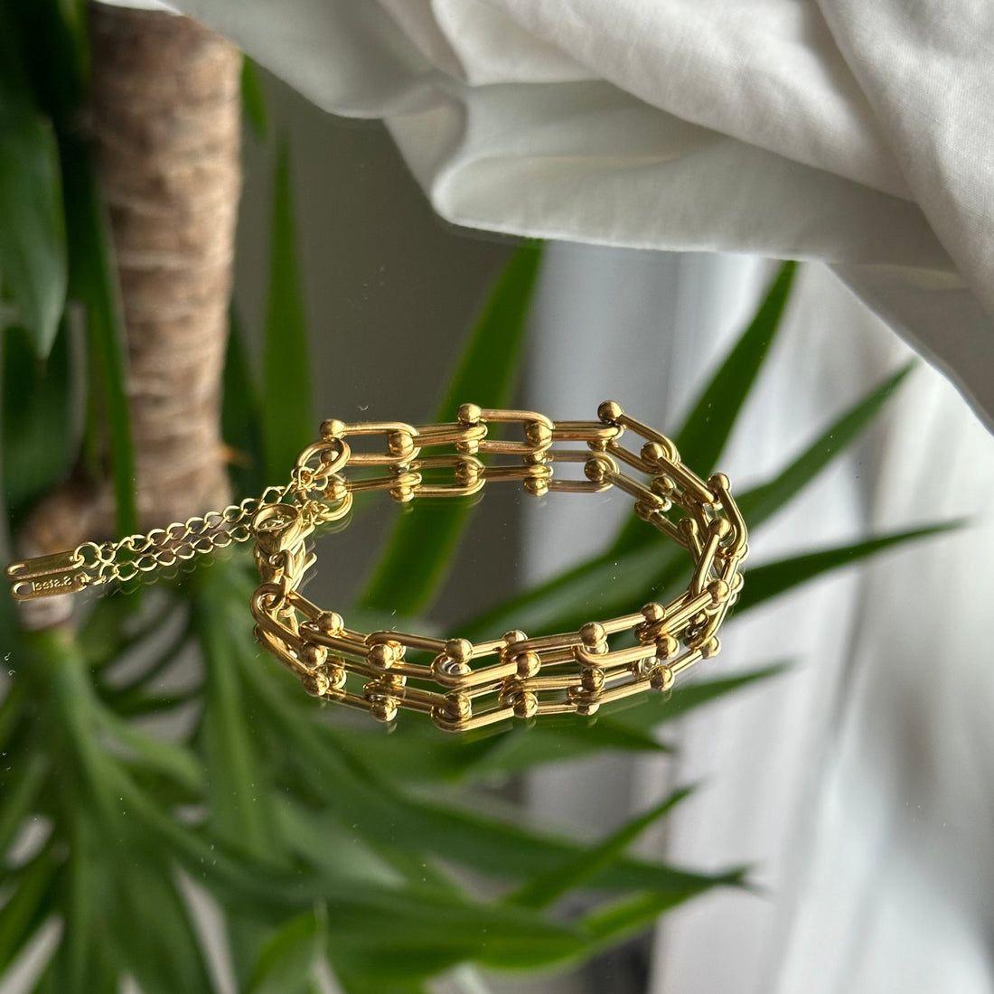 Serenity Golden-Tone Stainless Steel Hand Chain Bracelet
