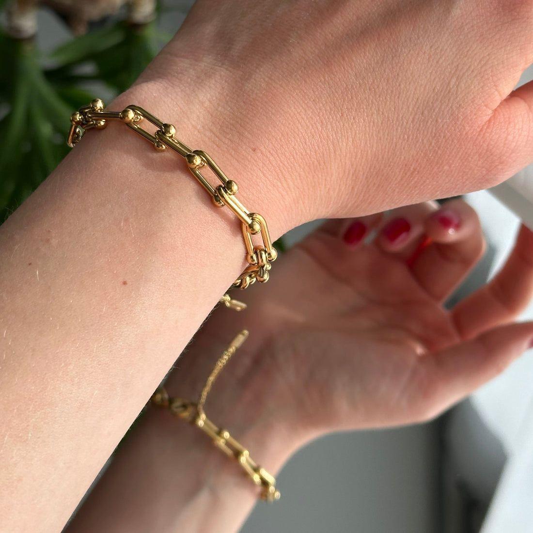 Serenity Golden-Tone Stainless Steel Hand Chain Bracelet